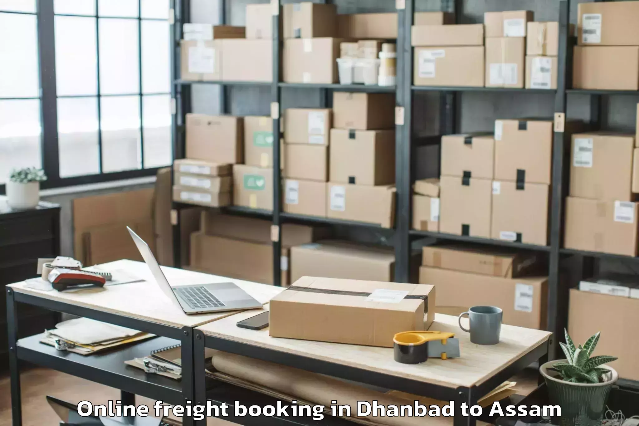 Quality Dhanbad to Gossaigaon Online Freight Booking